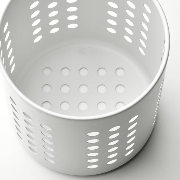 Bol en acier inoxydable perforé conçu avec précision avec un design épuré et moderne.