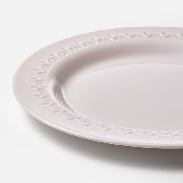 Assiette plate blanche avec bordure complexe, verre.