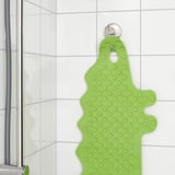 Le tapis de baignoire vert avec ventouses s’accroche au mur pour un séchage facile.