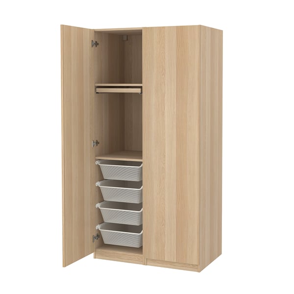 Armoire en bois de couleur claire avec 4 tiroirs blancs intégrés.
