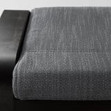 Gros plan du siège POÄNG, tissu gris doux, haute qualité, design axé sur le confort.