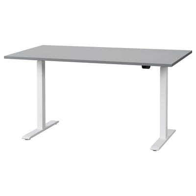 Un bureau assis-debout RODULF en gris avec un plateau rectangulaire élégant et des pieds blancs robustes avec une fonctionnalité de hauteur réglable.