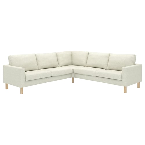 Canapé sectionnel moderne en forme de L crème avec pieds en bois, design minimaliste.