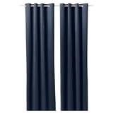 Rideaux en velours de coton bleu sain avec œillets pour un décor moderne.