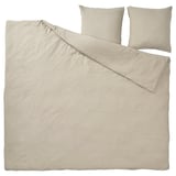 Parure de lit SCHERSMIN beige, avec couette et oreillers en mousseline de coton biologique. Design doux, respirant et texturé.