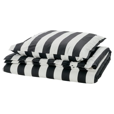 Parure de lit à rayures noires et blanches. Comprend une couette et des taies d’oreiller. Coton et rayonne tissés en percale, toucher croustillant. Design moderne à rayures.