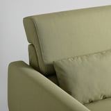 Canapé moderne vert olive avec dossier et assise rembourrés, conçu pour le confort.