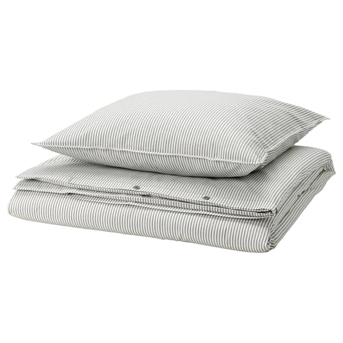 Ensemble de literie gris rayé empilé, avec housse de couette et taies d’oreiller, avec des lignes fines subtiles pour un design simple.