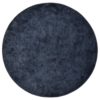 Tapis STOENSE circulaire bleu marine, poil épais doux, design uniforme.