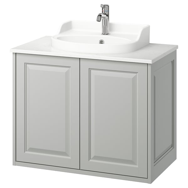 TÄNNFORSEN meuble de salle de bain gris clair avec lavabo blanc.