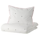 Housse de couette et taie d’oreiller blanches VÄNKRETS avec passepoil rose et motif à pois, en coton et viscose pour un sommeil confortable.
