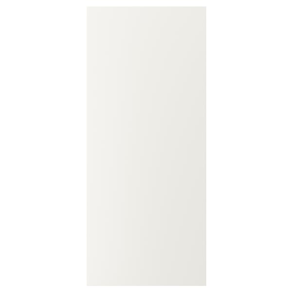 Une porte d’armoire de cuisine blanche VEDDINGE présente un design élégant et moderne avec des surfaces lisses.