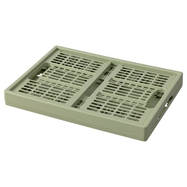 Une boîte pliante VEDKLYV en vert, en plastique polypropylène. Son rectangulaire avec des côtés ventilés pour la circulation de l’air.