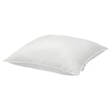 Un oreiller VILDKORN blanc, de forme rectangulaire, au design lisse, fabriqué à partir de matériaux en polyester et en coton.