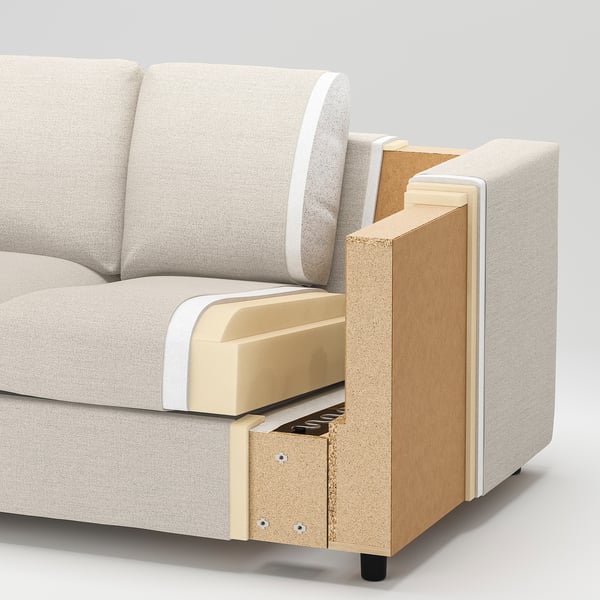 Canapé moderne avec assise en mousse, cadre en bois, revêtement en tissu, mécanique apparente.