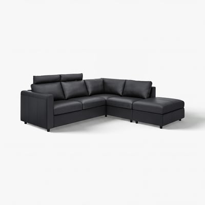 Canapé sectionnel IKEA VIMLE noir au design moderne, incluant sièges, coin, repose-pieds avec rangement et appuie-têtes.