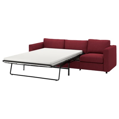 Canapé convertible rouge avec matelas extensible, design moderne.