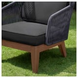 Chaise d’extérieur VINGSÖN noire, dossier en osier, coussin foncé, pieds en bois.