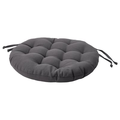 Il s’agit d’un coussin d’assise VIPPÄRT rond gris foncé avec des liens décoratifs, fabriqué à partir de matériaux recyclés.