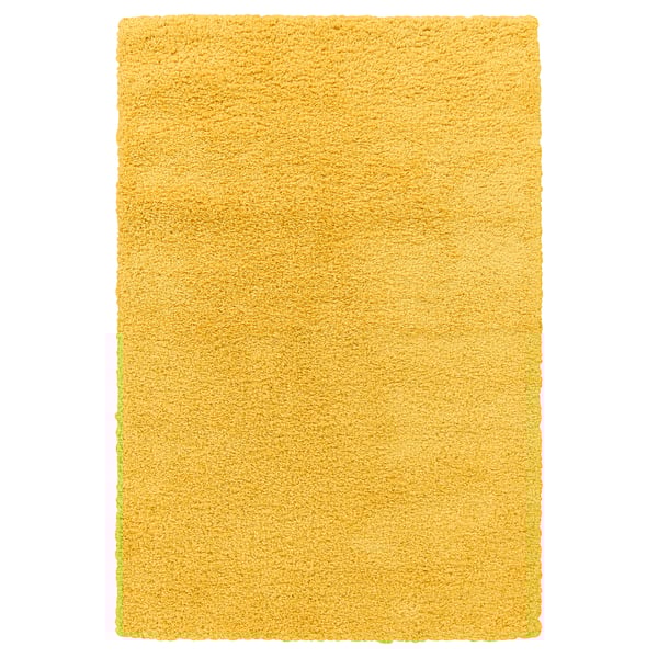 Shaggy, yellow rug - soft, durable, stain-resistant, warm, noise-reducing.