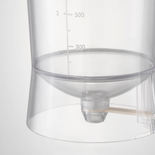 Clear plastic measuring jug with markings up to 500ml, featuring a wooden handle and a spout for precise liquid dispensing.