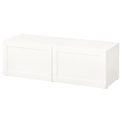 White BESTÅ storage unit, modern minimalist design, square shape, glossy finish.