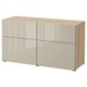 A BESTÅ sideboard with four cream-colored doors and drawers, featuring a sleek and minimalist design.
