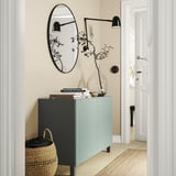 BESTÅ Storage combination with doors, dark grey/Hjortviken/Stubbarp pale grey-green, 120x42x74 cm