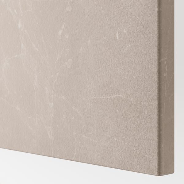 Close-up of BESTÅ units smooth, light beige surface with subtle texture, highlighting its sleek design.