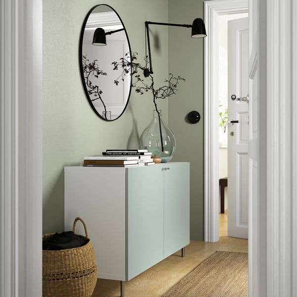 BESTÅ Storage combination with doors, white/Hjortviken/Ösarp pale grey-green, 120x42x74 cm