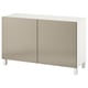 Modern BESTÅ sideboard in light brown with two doors and square legs.