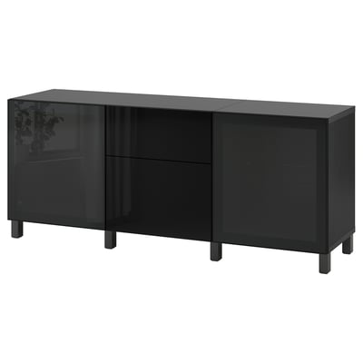 A black BESTÅ sideboard with glass doors and drawers. Modern, rectangular design offers ample storage.