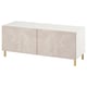 Modern BESTÅ tv stand: white top, beige marble-look drewdoors, soft-close, gold legs.