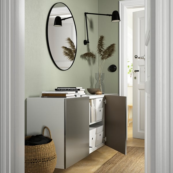 Modern wall-mounted cabinet combo with shelves and open doors, offers practical storage, and creates an airy, modern look.