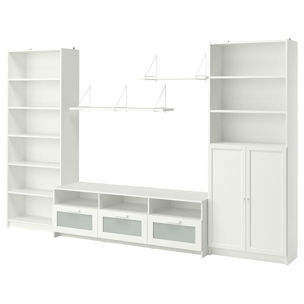 White BILLY storage combo: bookshelves, cabinets, tv bench. Maximises storage.