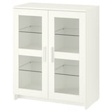 A white BRIMNES cabinet with glass doors on all sides, featuring adjustable shelves inside.