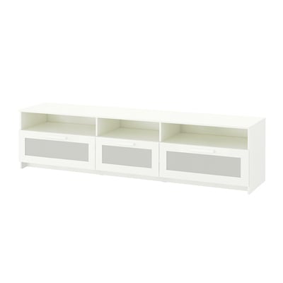 A white BRIMNES tv bench with glass doors and open shelves, ideal for organising tv accessories.