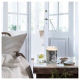BUKETTAPEL Scented candle/glass w lid/2 wicks, bergamot & cedarwood/pale green, 100 hr