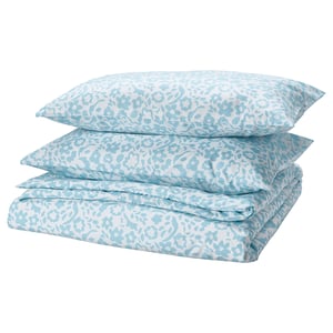 Turquoise CYMBALBLOMMA floral bedding set, folded neatly with blue flowers on white background, synthetic fabric.
