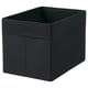Black fabric storage box, square-shaped with handles, fits bookcases or closets.