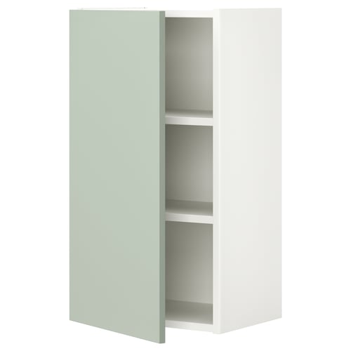 Green ENHET wall cabinet with two shelves, grey door, minimalist style.