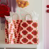 FÖSSTA Gift bag, mixed patterns red, 26x35 cm