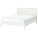 A white GULLABERG bed with a panelled headboard and sturdy legs.