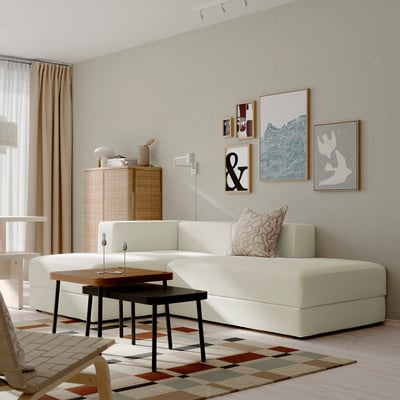 JÄTTEBO modular sofa in beige, spacious, with accessories.