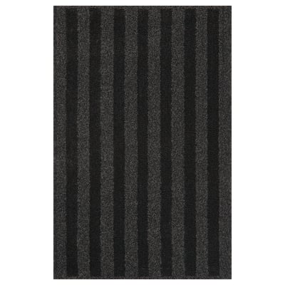 A dark grey LANDSVÄG rug with vertical stripes, featuring a soft, low pile texture.