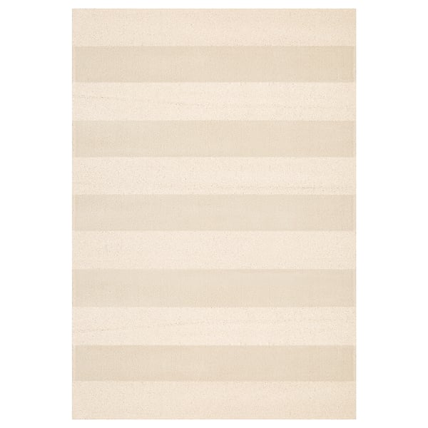 Off-white stripe rug, rectangular, soft yarn stripes.