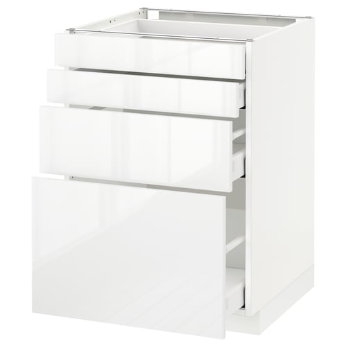 White METOD kitchen cabinet with three open drawers.