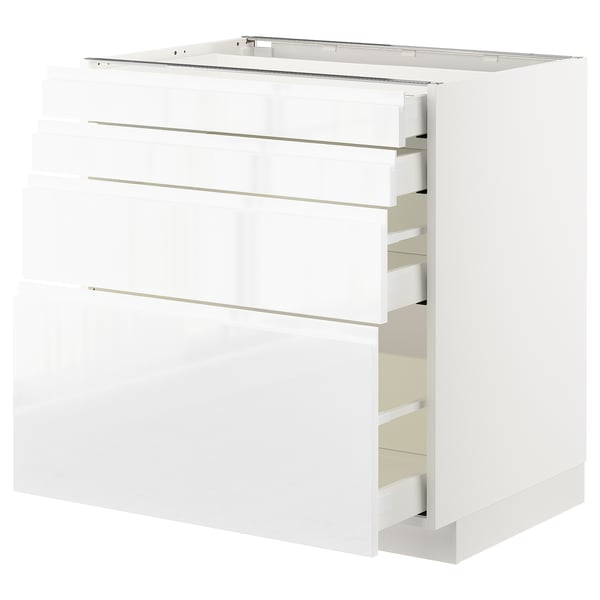 White METOD kitchen unit with three drawers, sleek handle-less design.