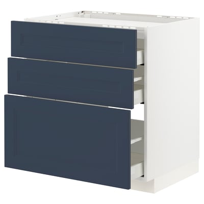 METOD kitchen unit with blue axstad drawers, three drawers, white base.