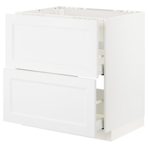 White METOD cabinet with open drawers, sleek, minimalist design.